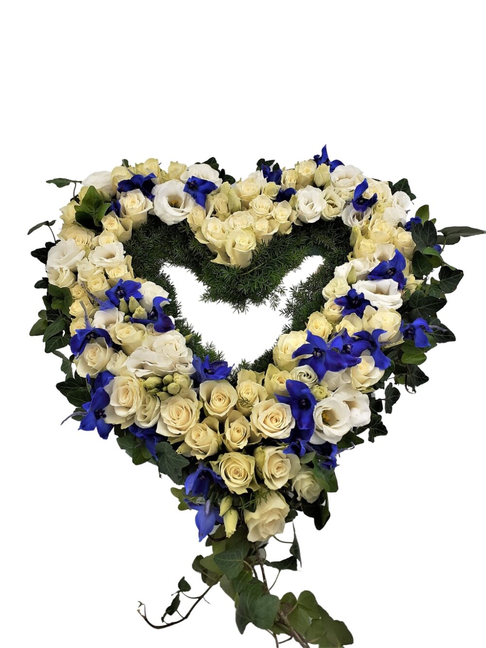 Begravningskrans i blått och vitt hos Bellis blomsterhandel.