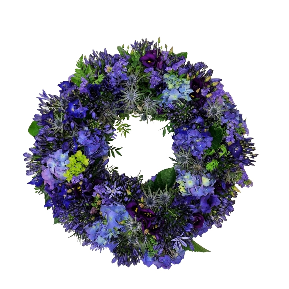 begravningskrans-blå-blommor-bellis-blomsterhandel